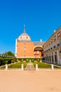 Beautiful garden between a church and a palatial building.