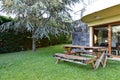 A beautiful garden with an old table inside