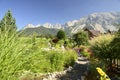 Beautiful garden in ramsau dachstein austria with mauntains in the back Royalty Free Stock Photo