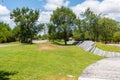 Beautiful garden of Troia covered with green trees in the municipality of Grandola, Portugal