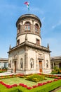 Beautiful gardens and tower on top of Chapultepec Castle in Mexico City Royalty Free Stock Photo