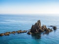 Beautiful Gata Cape landscape with rock formations in the water during sunset in Andalucia, Spain