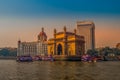 Beautiful Gateway of India near Taj Palace hotel on the Mumbai harbour with many jetties on Arabian sea Royalty Free Stock Photo