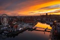 Beautiful Gdansk city over the Motlawa river at sunset. Poland Royalty Free Stock Photo