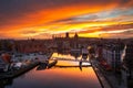Beautiful Gdansk city over the Motlawa river at sunset. Poland Royalty Free Stock Photo