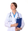 Beautiful general practitioner is working with joy. She is standing with a folder of documents in her hand Royalty Free Stock Photo