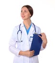 Beautiful general practitioner is working with joy. She is standing with a folder of documents in her hand Royalty Free Stock Photo