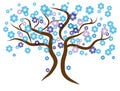 Beautiful gentle blue tree. Brown branches with blue and violet flowers.