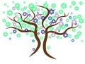 Beautiful gentle green tree. Brown branches with green, violet and blue flowers.