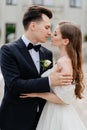 beautiful, gentle and happy bride and groom hugging and kissing Royalty Free Stock Photo