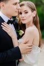 beautiful, gentle and happy bride and groom hugging Royalty Free Stock Photo