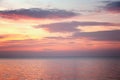 Beautiful gentle pink blue sunset over the calm sea, beautiful natural background Royalty Free Stock Photo