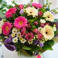 Beautiful gently bouquet on white table at a window