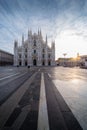 Beautiful geometric picture of Piazza Duomo of Milan at sunrise and sun star Royalty Free Stock Photo