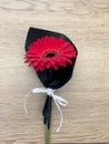 Beautiful gerbera flower on wood background. Singl bouquet.