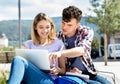 Beautiful german student couple with computer Royalty Free Stock Photo