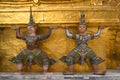 Beautiful Giants statue decorated exterior at the Emerald Buddha temple architecture in Wat Phra Kaew at the Grand Palace in