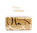 Beautiful gift box in gold paper isolated Royalty Free Stock Photo