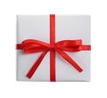 Beautiful gift box with red bow isolated on white, top view Royalty Free Stock Photo