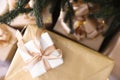 Beautiful gift boxes under Christmas tree, top view. Space for text Royalty Free Stock Photo