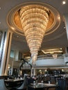 A beautiful gigantic chandelier inside The Restaurant of Dusit Thani Hua Hin Hotel in Thailand.