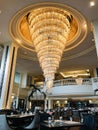 A beautiful gigantic chandelier inside The Restaurant of Dusit Thani Hua Hin Hotel in Thailand.