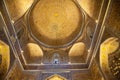 Beautiful gilded ceiling with ornaments, mosaics and Arabic inscriptions in the Gur Emir mausoleum in Samarkand, Uzbekistan. 29.04 Royalty Free Stock Photo