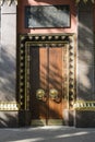 Gilding and monumental tree. entrance, gates, doors to a Buddhist temple. the concept of reliable protection