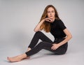 Beautiful ginger woman in dark clothes