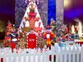 Beautiful gingerbread house with white picket fence