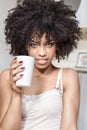 Beautiful girl with afro relaxing.