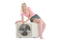 Beautiful girl with the air conditioner. Royalty Free Stock Photo