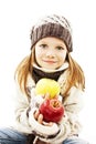 Beautiful girl with apple. Winter style.