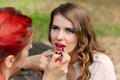 Beautiful girl applying makeup Royalty Free Stock Photo