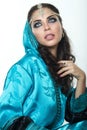 Beautiful girl in the Arab image with bright oriental make-up. Royalty Free Stock Photo