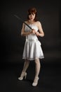 Beautiful girl armed with sword Royalty Free Stock Photo