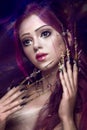 Beautiful girl with art make up in anime style, creative long nails. Design manicure. Beauty face. Royalty Free Stock Photo