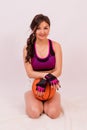 Beautiful girl of Asian appearance dressing for a sport with a ball for game in basketball. Royalty Free Stock Photo