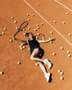 Beautiful girl athlete on the tennis court. Tennis training, racket and ball, concept. Royalty Free Stock Photo