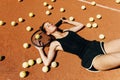 Beautiful girl athlete on the tennis court. Tennis training, racket and ball, concept. Royalty Free Stock Photo