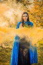 Woman with a colorful smoke bomb, ideas for party Royalty Free Stock Photo