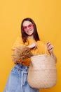 beautiful girl Beach bag fashion in yellow t-shirt denim shorts Lifestyle unaltered Royalty Free Stock Photo