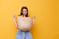 beautiful girl Beach bag fashion in yellow t-shirt denim shorts Lifestyle unaltered Royalty Free Stock Photo