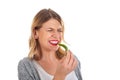 Beautiful girl biting of a hot paprika Royalty Free Stock Photo