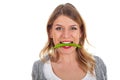 Beautiful girl biting of a hot paprika Royalty Free Stock Photo