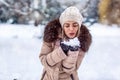 Beautiful girl blowing magic snow. Christmas magic. Royalty Free Stock Photo