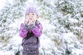 Beautiful girl blowing snow in Christmas Royalty Free Stock Photo