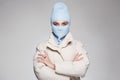 Beautiful girl in blue balaclava. Trendy Mask on pretty woman Royalty Free Stock Photo