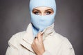 Beautiful girl in blue balaclava. winter fashion Royalty Free Stock Photo