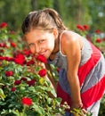 Beautiful girl with blue eyes in garden Royalty Free Stock Photo